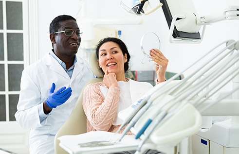 Woman smiling at the dentist