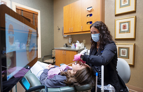 Dental patient having digital scans of their teeth taken
