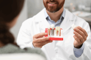 a patient and dentist chatting about dental implants 